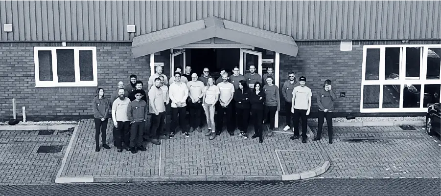 staff outside building